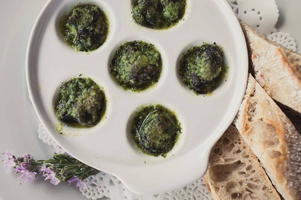 Snails prepared in butter, shallots, parsley, and garlic.  Photo: Jamila Toderas