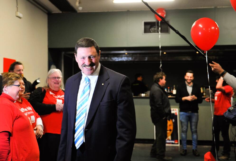 Former solider and Army lawyer Mike Kelly at the Queanbeyan Leagues Club on election night, where he celebrated his recapturing of the seat. Photo: Jay Cronan