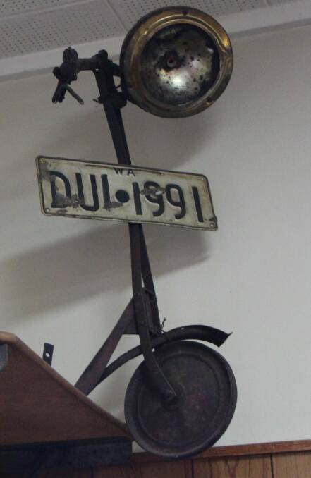 A subtle message not to drink and drive: a number plate on an old bike on display at the front bar of the Federal Hotel in Nimmitabel. Photo: Dave Moore