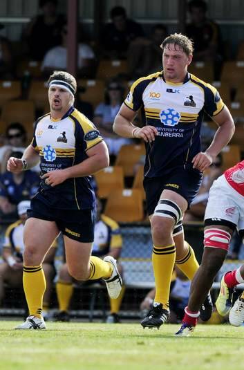 Etienne Oosthuizen, right, is hoping to impress back in his homeland on the Brumbies' South African tour. Photo: Jay Cronan