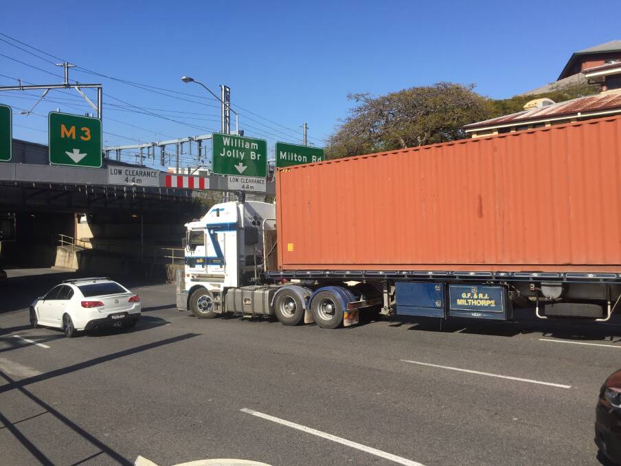 An oversize struck found himself stuck on Countess Street at the rail bridge on Monday morning. Photo: Elizabeth Silvester/Fairfax Media
