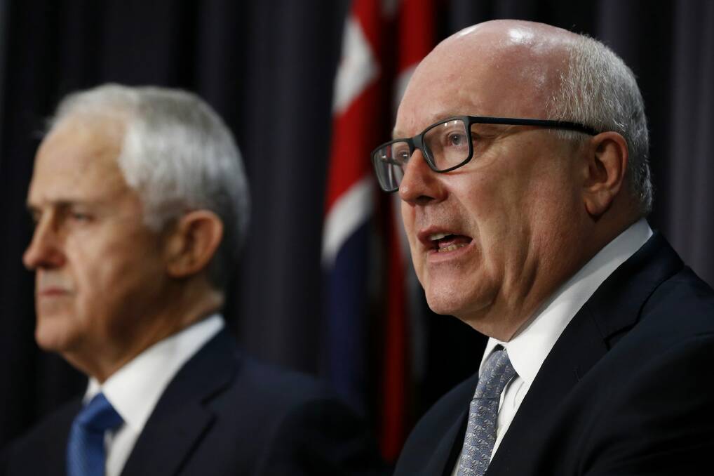 Attorney-General George Brandis has urged the High Court to see to the citizenship saga as quickly as possible.  Photo: Alex Ellinghausen