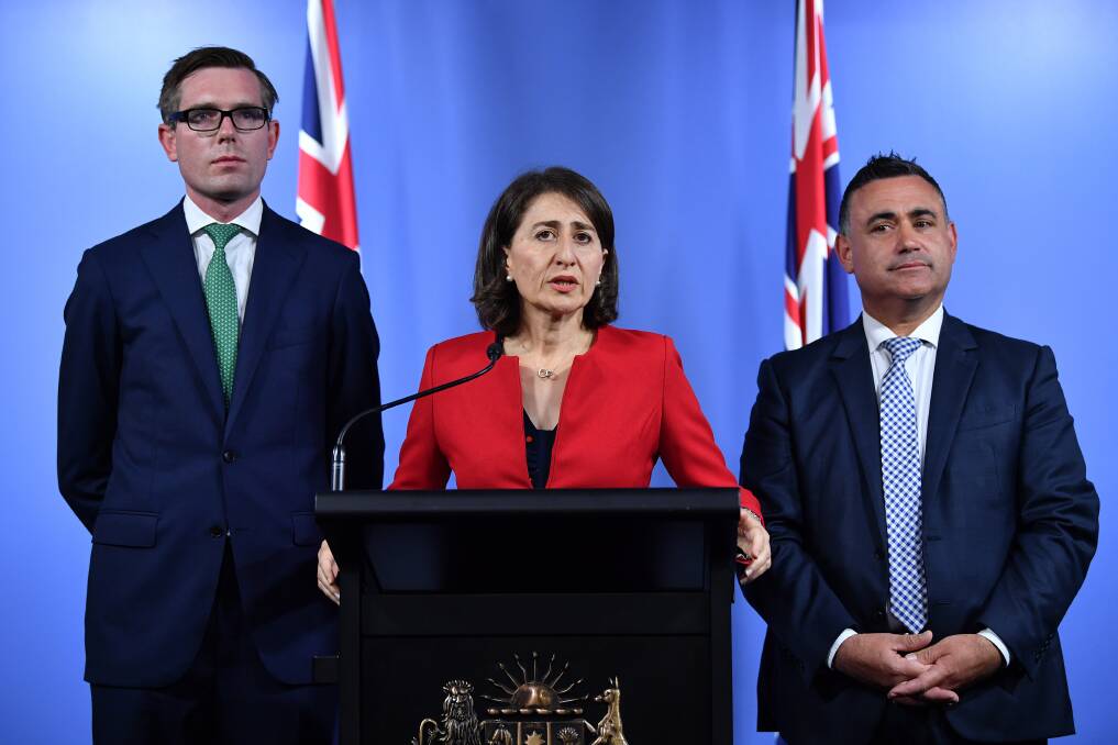 NSW Treasurer Dominic Perrottet, Premier Gladys Berejiklian and Deputy Premier John Barilaro have announced a budget targeting roads, health and education in the region surrounding Canberra. Photo: AAP