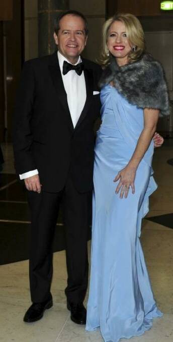 Bill Shorten and Chloe Bryce arrive at Parliament House for the Midwinter Ball. Photo: Melissa Adams