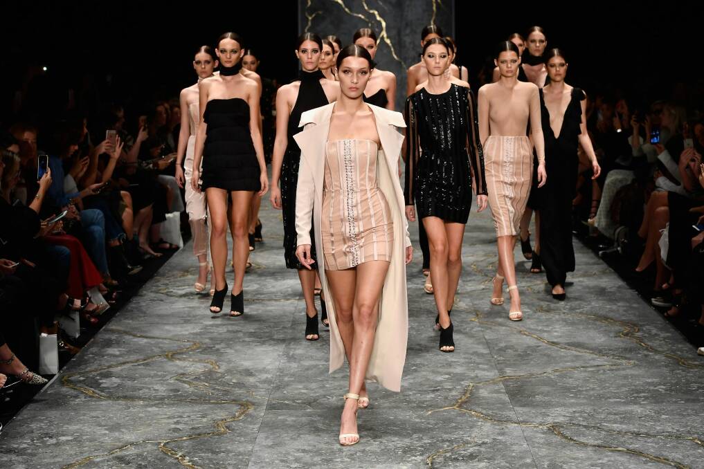 Bella Hadid leads the models as they walk the runway during the Misha show at Mercedes-Benz Fashion Week Resort 17 Collections at Carriageworks. Photo: Stefan Gosatti
