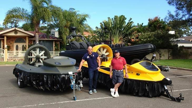 Peter Hardi, left, and NSW Hovercraft Club president Karl Bowman, with hovercrafts they were hoping to bring to Canberra to provide free rides for sick and disadvantaged children. Photo: Supplied