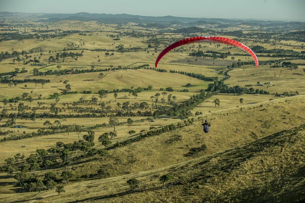 Franz Grossbechler paragliding from Spring Range. Photo: Karleen Minney