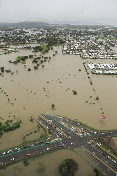 Flooding in Townsville, shortly after bushfires and drought. Photo: AAP