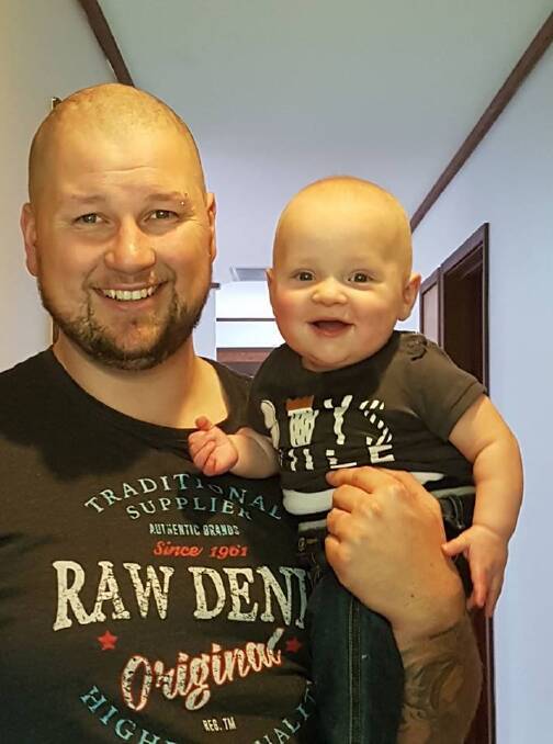 Little Dolton Wiggins, with dad James, turned 1 on Sunday, happy and healthy a year on from his very premature entry to the world. Photo: supplied