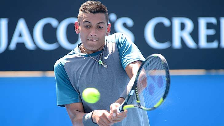 Nick Kyrgios keeps his eyes on the ball during his match against Benjamin Becker on Tuesday. Photo: Pat Scala