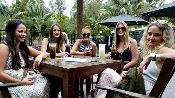 Setting up for a big New Year's Eve are (l-r) Lara Robinson, Lucy Berry, Yasmin Sheean, Casie Louttit, and Sophie Nedwick with drinks at Murramarang Beachfront Nature Resort. Photo: Jay Cronan