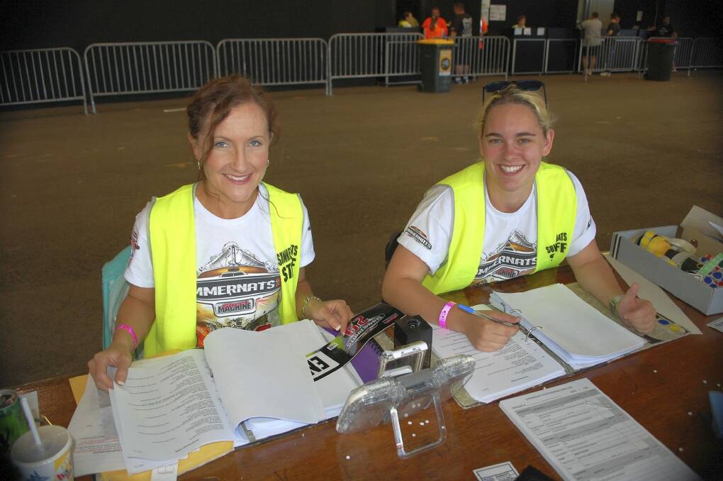 Summernats scrutineering team members Rhiannon Sharp and Olivia Fripp from Wollongong worked hard to process the 2000 cars expected to take part. Photo: David Ellery