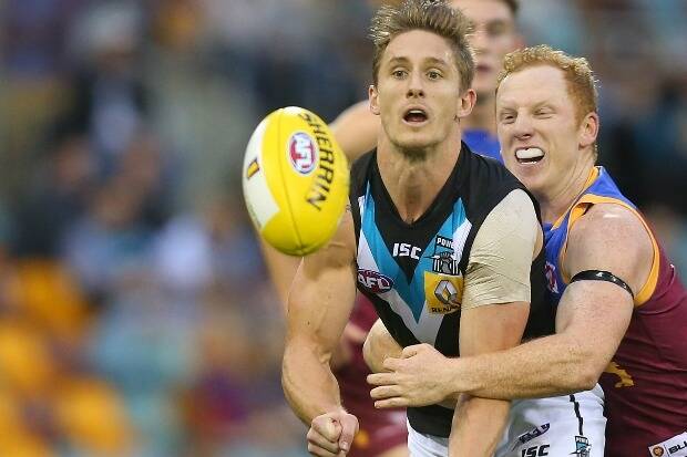 Port's Hamish Hartlett was allowed back on the field despite rules requiring a head injury assessment. Photo: Getty Images