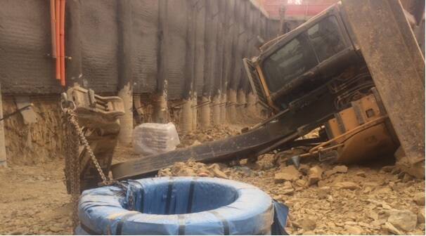 A 15-tonne excavator, which rolled during work at a Civic construction site on Wednesday morning.  Photo: Supplied.