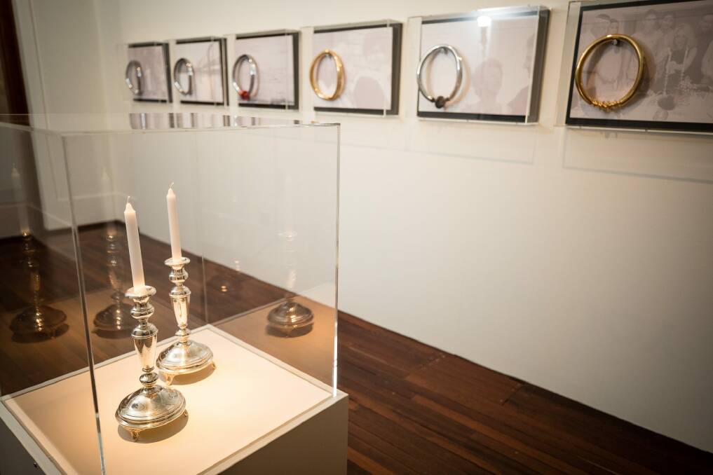 A pair of Shabbat candlesticks and a series of necklaces feature in work by Lousje Skala as part of The Gift, an exhibition about migration at the Museum of Australian Democracy at Old Parliament House in Canberra. Photo: Mark Nolan