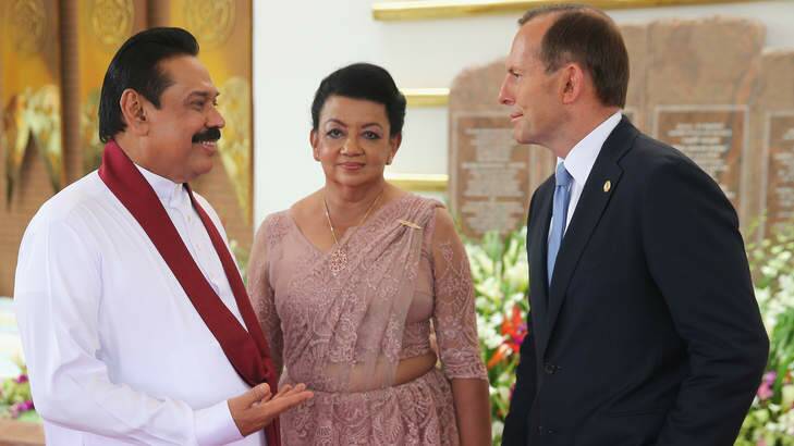 Tony Abbott, pictured with Sri Lanka's President Mahinda Rajapakse and his wife, has been criticised for giving Sri Lanka two boats to deal with people smuggling. Photo: Chris Jackson