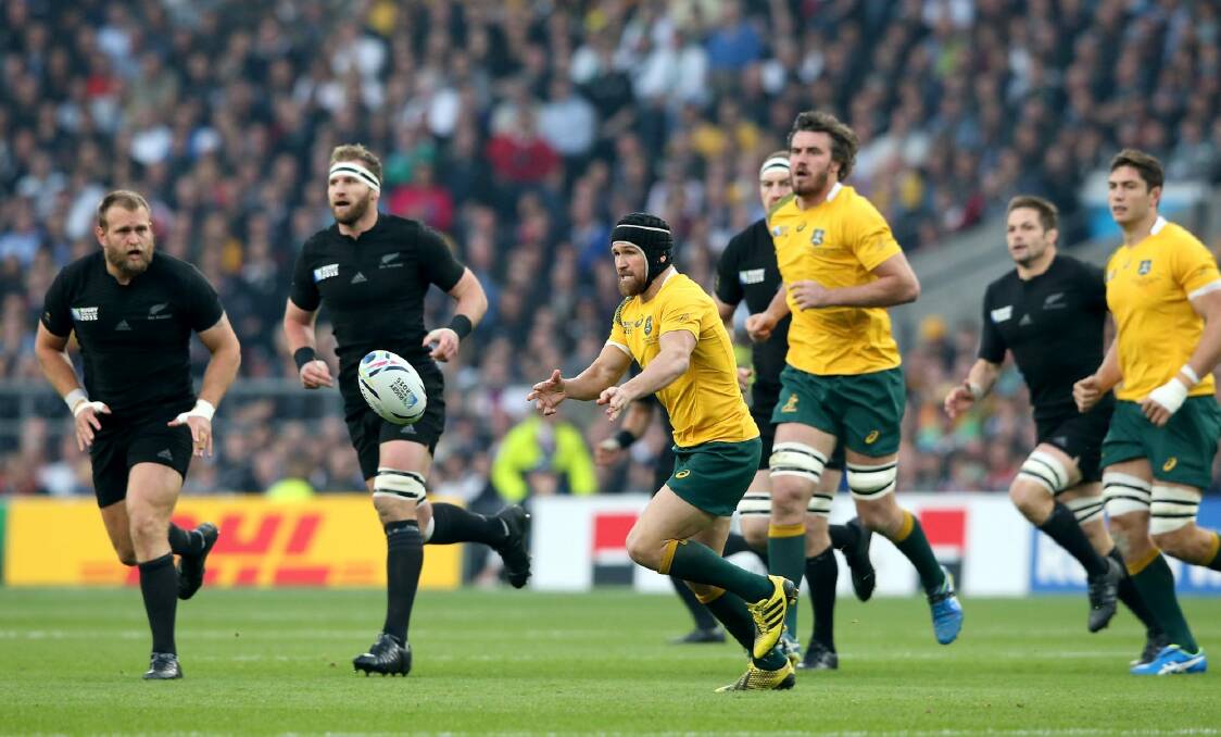 Angry: Matt Giteau (in headgear) was devastated when his World Cup final ended after just 25 minutes. Photo: David Rogers