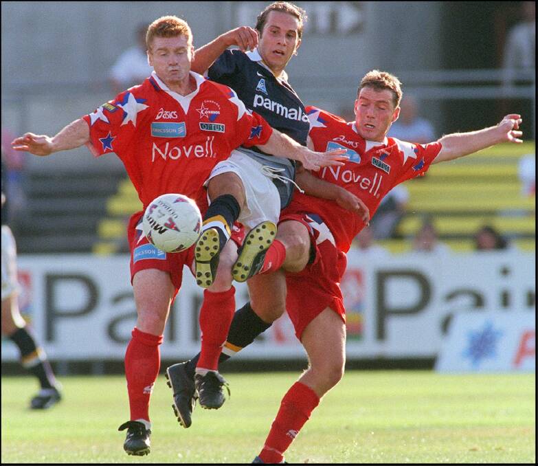 Canberra Cosmos in action against Carlton in the NSL in 1998. Photo: Ken Irwin