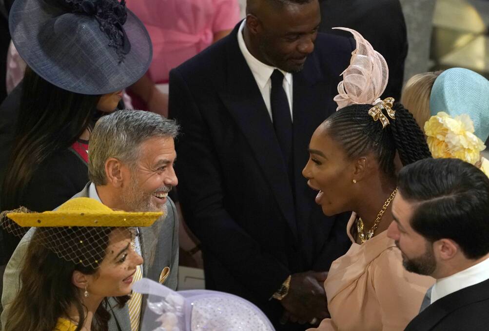 George and Amal Clooney greet Serena Williams and Alexis Ohanian before the wedding ceremony.