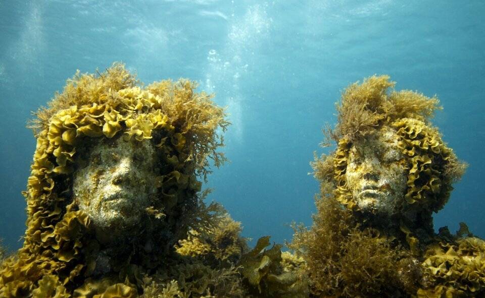 Two of Jason deCaires Taylor's underwater sculptures. Photo: Jason deCaires Taylor