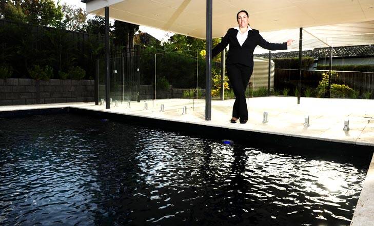 The luxury Red Hill property also boasts a swimming pool. Photo: Melissa Adams