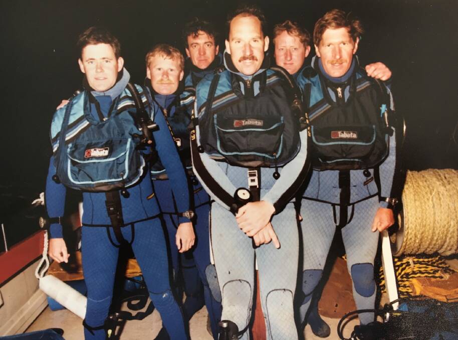 Shane Connelly, second from left, with the police diving team. Connelly's diving role saw him undertake an exhaustive underwater search for the Winchester murder weapon.
