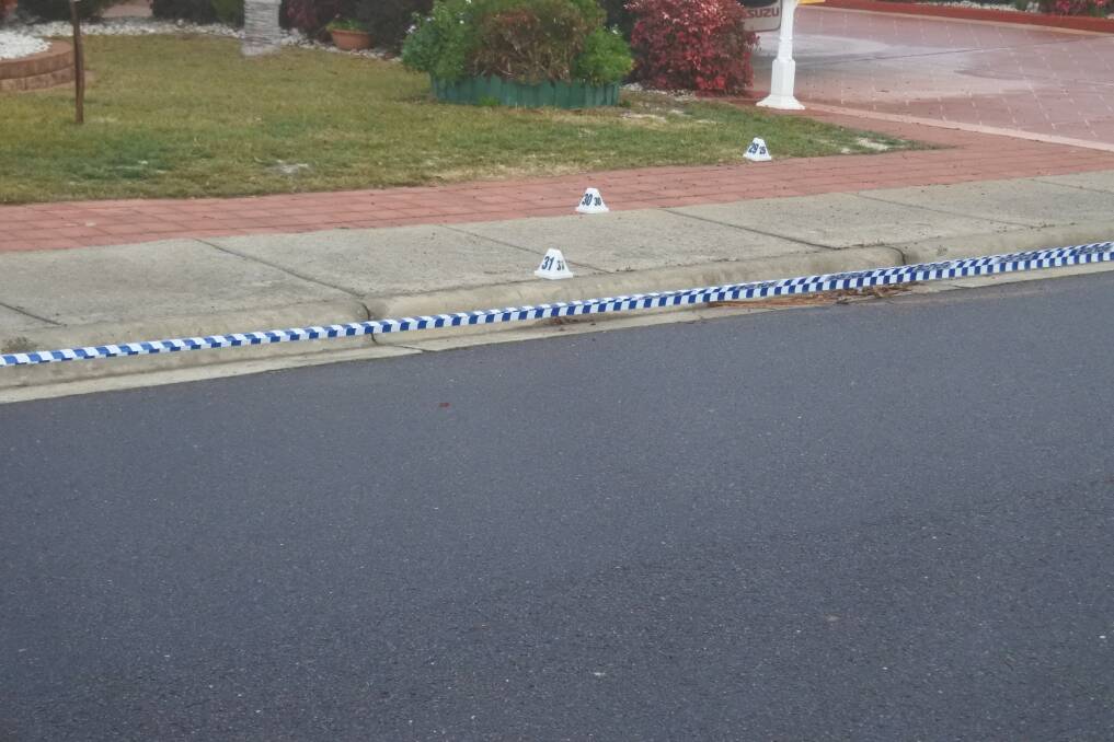 Crime scene cones numbered up to 31 could be seen outside the houses on Friday morning. Photo: Blake Foden