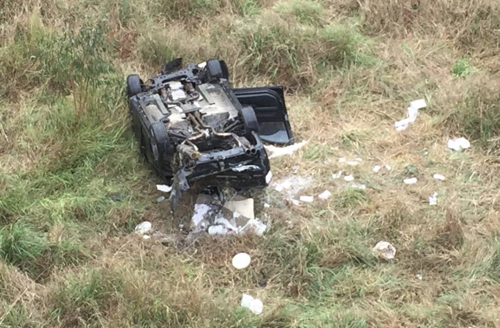 A man was taken to the Princess Alexandra Hospital in a critical condition after a single vehicle crashed down an embankment at Augustine Heights. Photo: Nine News Queensland