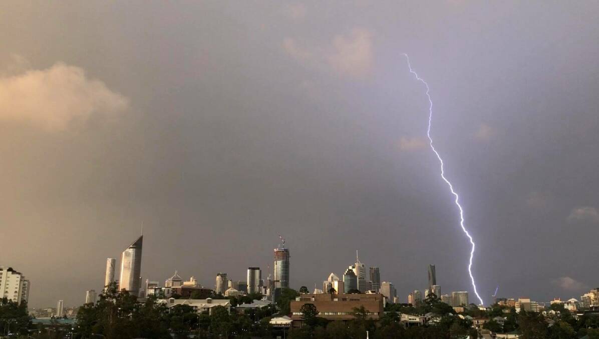 Lightning strikes over Brisbane on Friday evening. Photo: Ben Mihan - Supplied