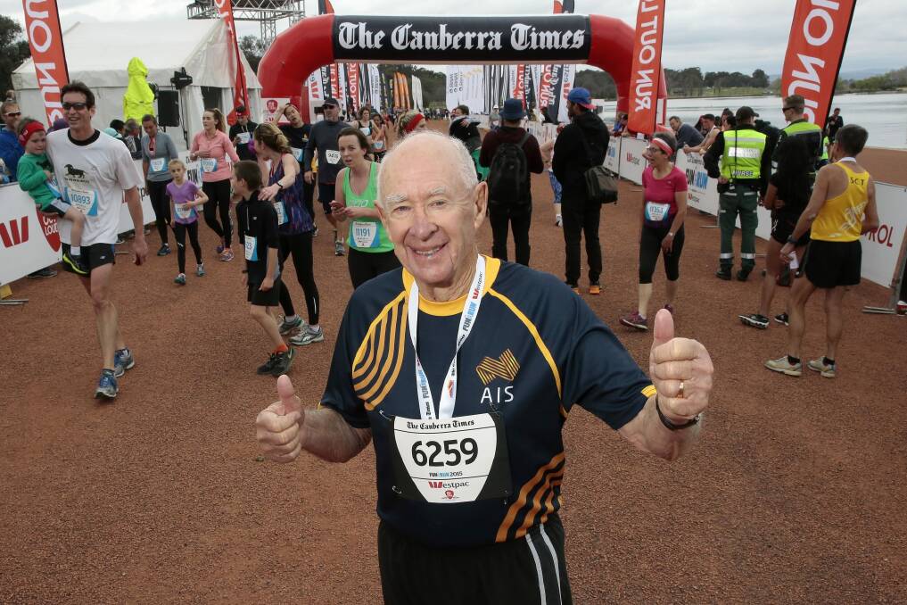 The Canberra Times 2015 Fun Run's oldest competitor, John Beagle, 83, after crossing the finish line. Photo: Jeffrey Chan