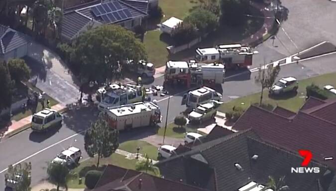 The residential street was flooded with emergency services. Photo: 7 News Brisbane - Twitter