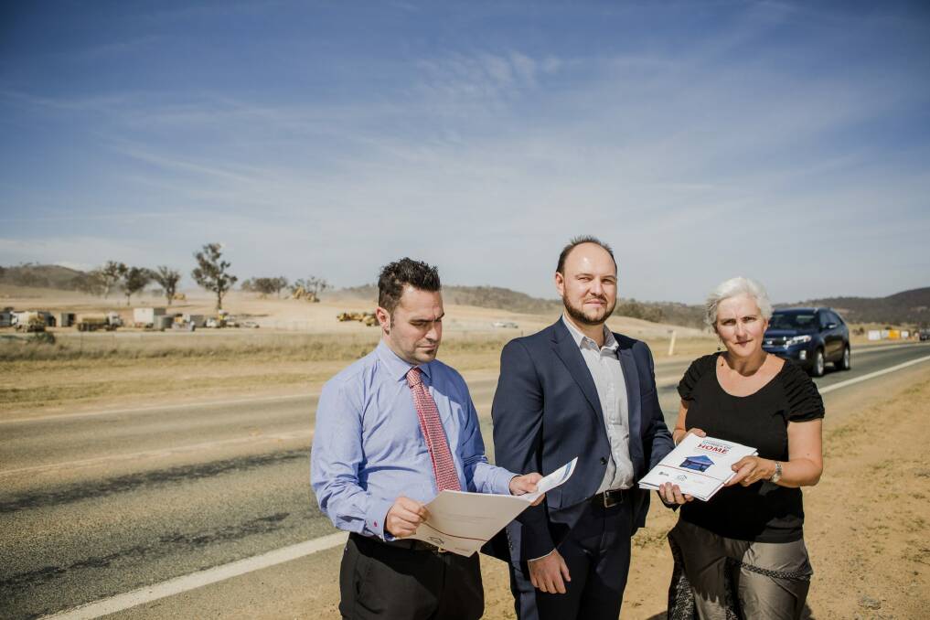 The Stories of Home report is being given to ACT election candidates. From left, executive officer of ACT Shelter Travis Gilbert, Independent candidate for the electorate of Yerrabi, Andrew Dewson, and ACTCOSS director Susan Helyar. Photo: Jamila Toderas