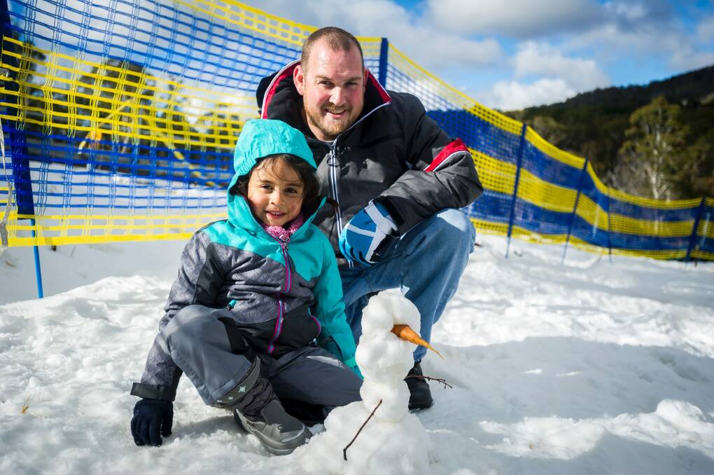 John Dryden and Lily Dryden, 5, at Corin Forest on Saturday.  Photo: Dion Georgopoulos