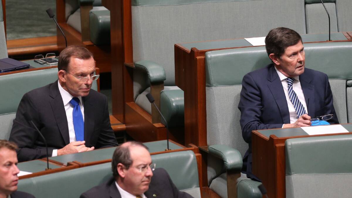 Tony Abbott and Kevin Andrews listen to Prime Minister Malcolm Turnbull deliver a ministerial statement on national security in Parliament on Tuesday. Photo: Andrew Meares