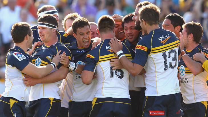 The Brumbies celebrate their last-minute home win over the Cheetahs in May 2012. Photo: Getty Images