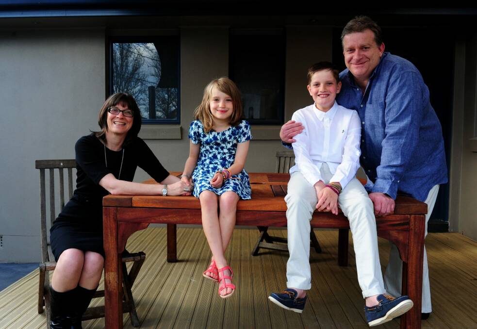  Joanne Greenfield and Morris Carpenter with their children Ellen Carpenter, 8 and Owen Carpenter,10 at their family home in Hackett. They will become citizens on Wednesday at the Albert Hall.  Photo: Melissa Adams 
