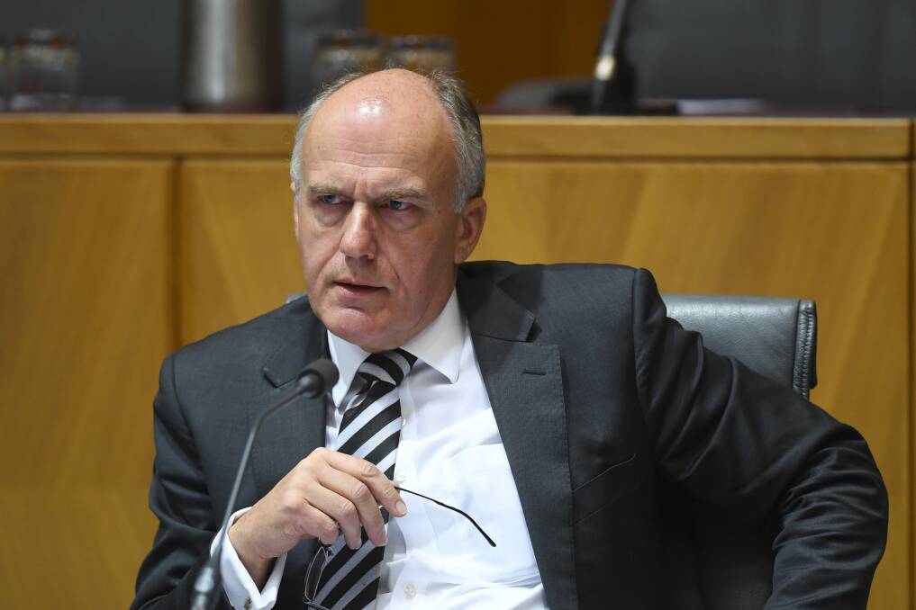 Senator Eric Abetz defended John Lloyd after a code of conduct investigation into the public service commissioner. Photo: AAP