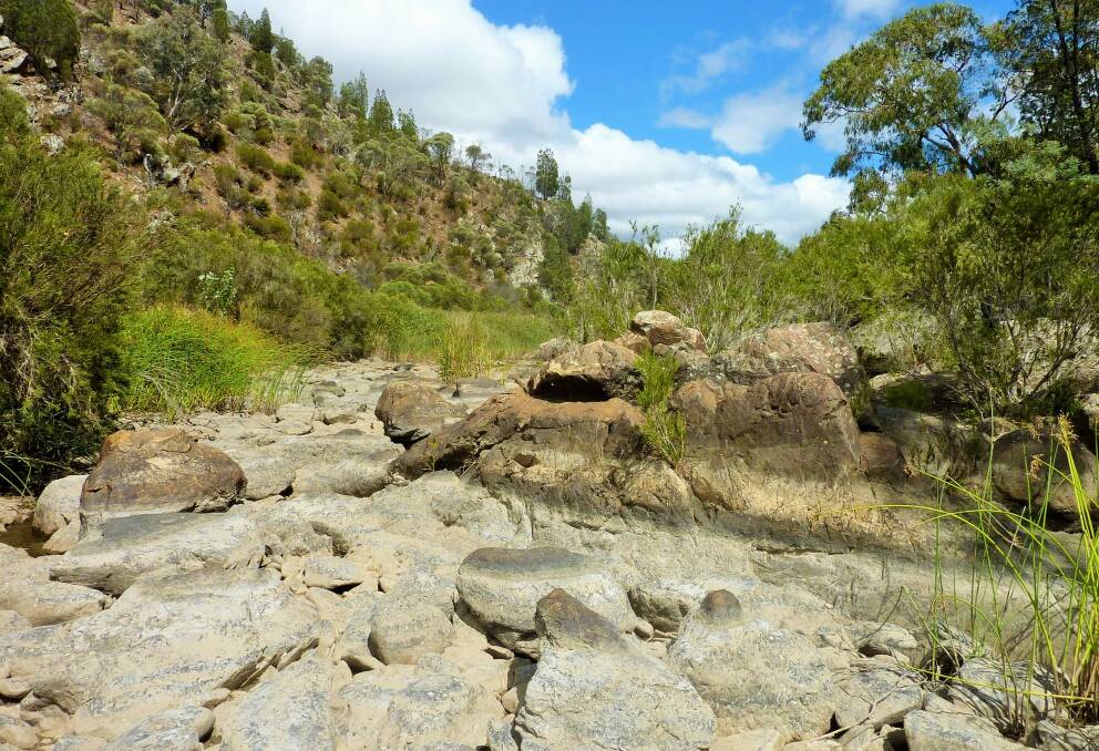 Water levels at Molonglo Gorge can vary dramatically depending on recent rainfall. Here the water barely trickles through a maze of rocks.  Photo: Tim the Yowie Man