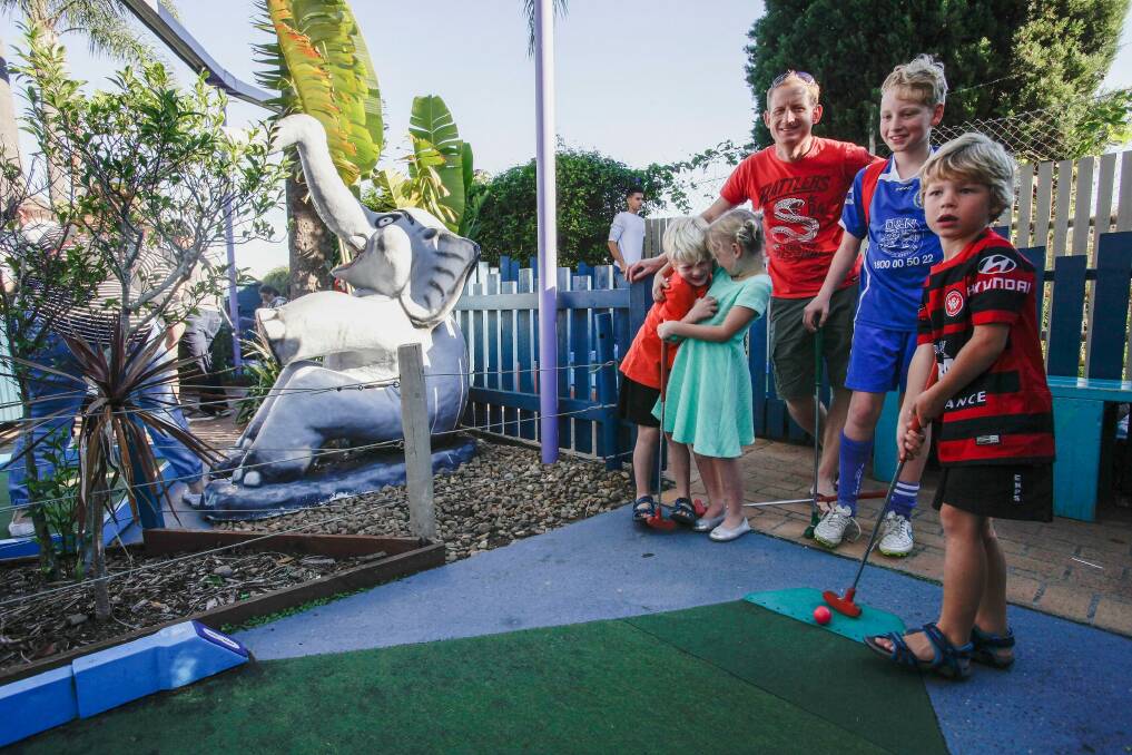 Jonathan Wilkes with (left to right) son Nathan 7, niece Abigail Soper 7, nephew Michael Habbard 12 and Benjamin 6 at the closure of Ermington Putt Putt. Photo: Fiona Morris