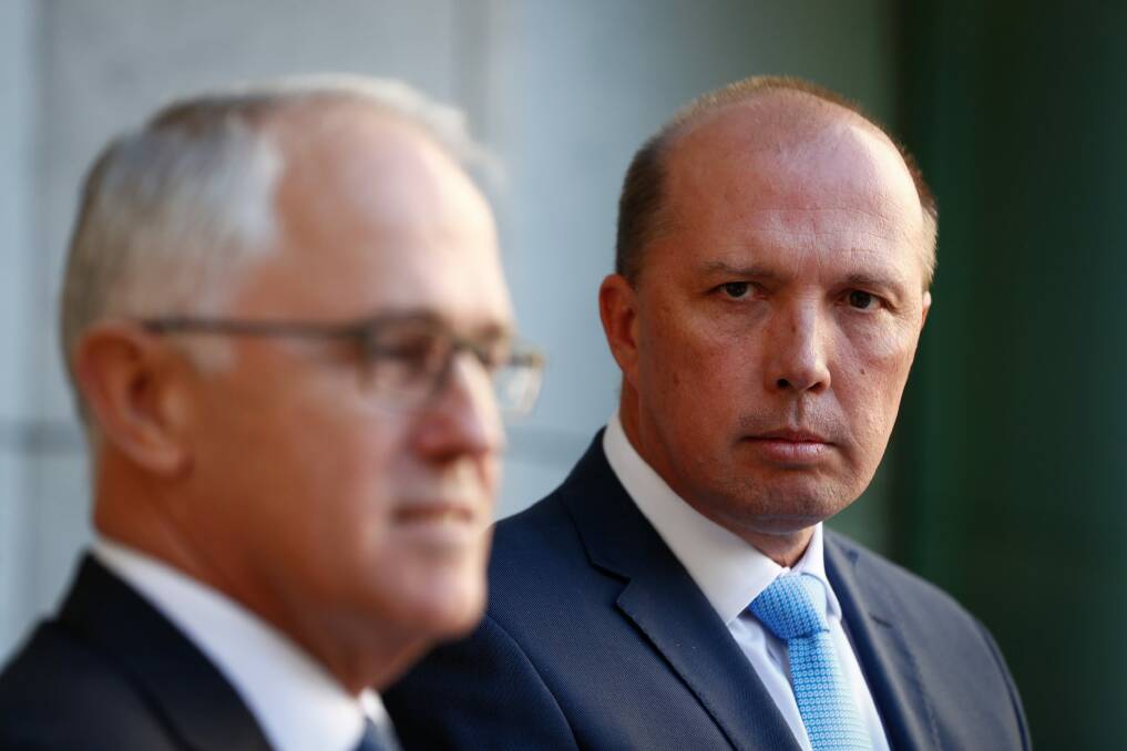 Prime Minister Malcolm Turnbull with Immigration Minister Peter Dutton. Photo: Alex Ellinghausen