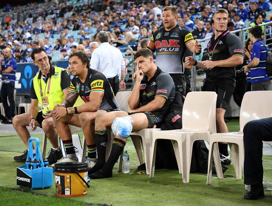 Insult to injury: Nathan Cleary looks on as the Panthers suffer their first loss of the season on Friday night. Photo: NRL Photos