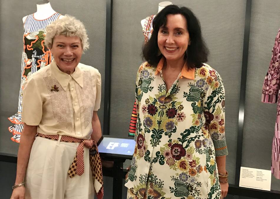 Brisbane fashionistas Lydia Pearson (left) and Pamela Easton pictured at the launch of the new Museum of Brisbane exhibition. Photo: Alison Brown