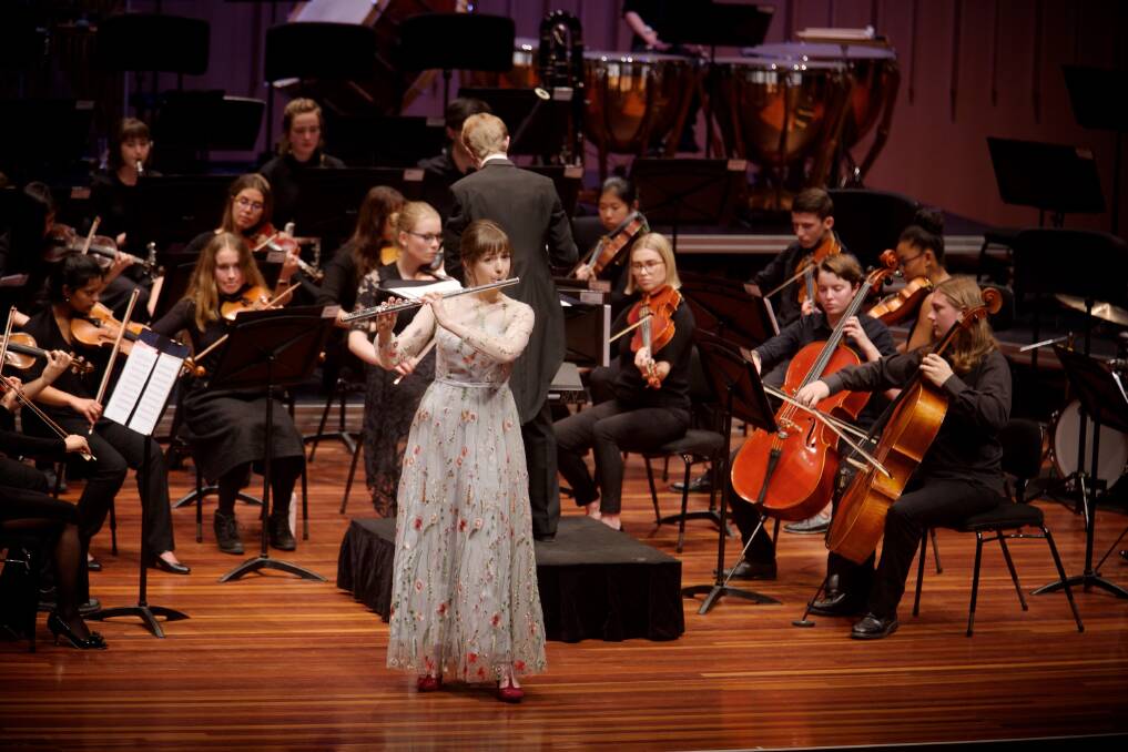 Flautist Serena Ford performs at the Canberra Youth Orchestra concert conducted by Leonard Weiss.  Photo: Supplied