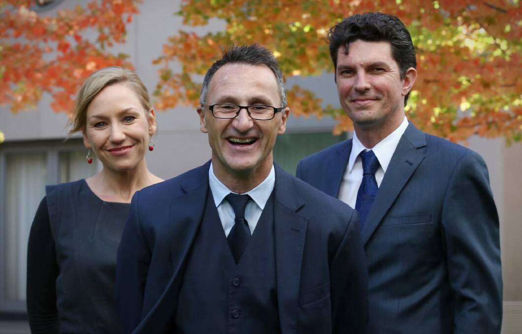 Scott Ludlam (right) and Larissa Waters (left) served as co-deputies to Greens leader Richard Di Natale.  Photo: Andrew Meares