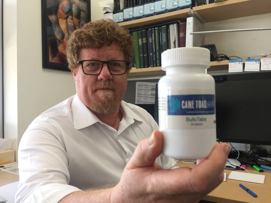  Professor Rob Capon from University of Queensland's Institute of Molecular Bioscience, with his bottled cane toad baits. Photo: Tony Moore