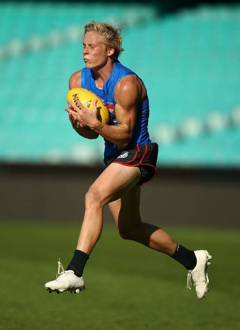 Back in the fold: Isaac Heeney at Swans training. Photo: Getty Images