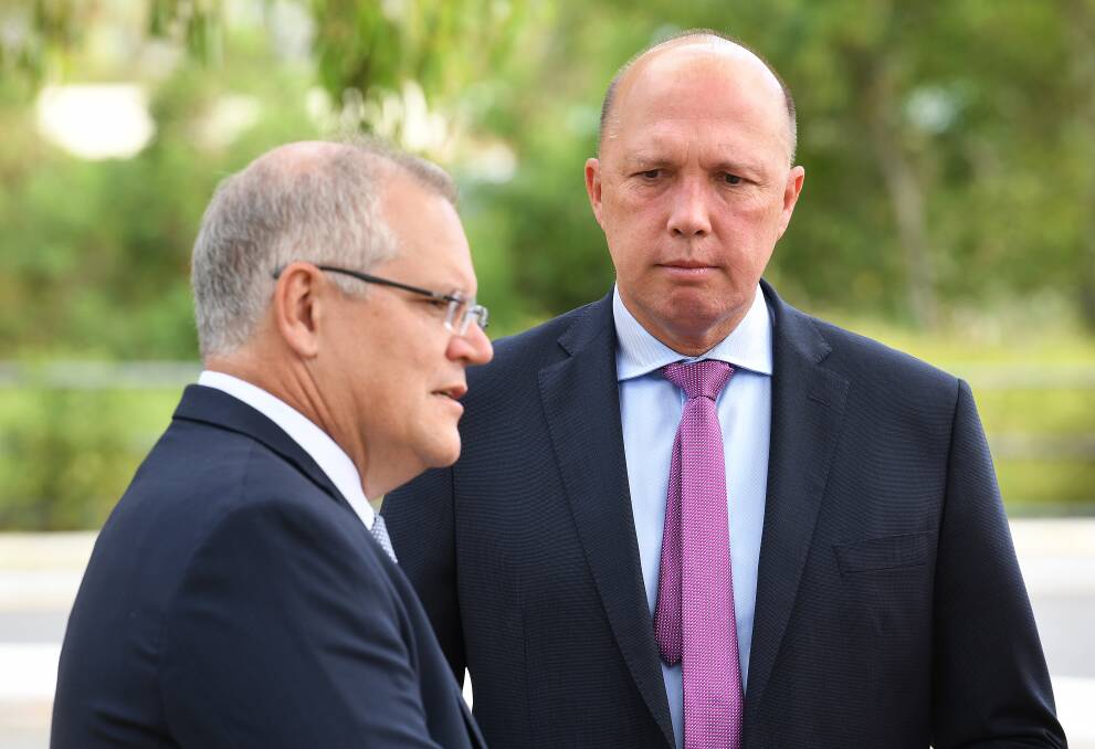Australian Prime Minister Scott Morrison (left) and Minister for Home Affairs Peter Dutton. Photo: AAP