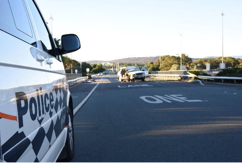 The car crash caused damage to the guard rail on Commonwealth Avenue bridge and forced the closure of one southbound lane for several months. Photo: Twitter/ACT Policing