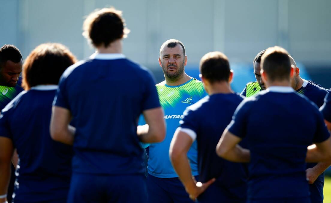 Michael Cheika addresses the Wallabies at training on Thursday. Photo: Getty Images