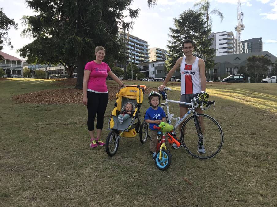 Meet Brisbane's fittest family, Aidan and Peta Hobbs and their children Levi and baby Nathan. Photo: Alison Brown